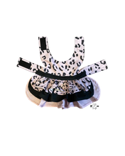 Load image into Gallery viewer, Flat lay of Pink Purr-fiction three-tier harness dress for dogs
