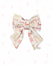 Load image into Gallery viewer, Large sailor bow with 'love' text on a white background