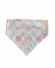 Load image into Gallery viewer, Dog bandana with Easter egg and bow pattern on a blush pink background
