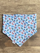 Load image into Gallery viewer, Reversible patriotic dog bandana with cowboy boots, hats, and cactus
